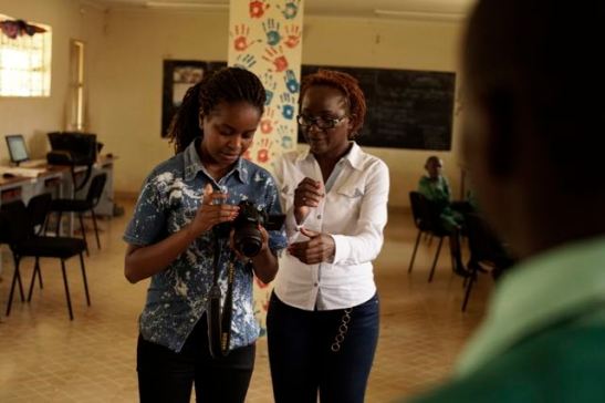 Emma with her student Rispa, who is working as a production coordinator.