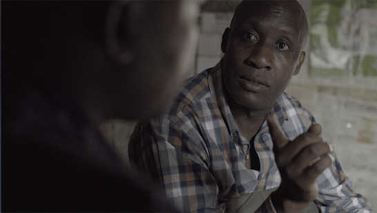 Uncle talking to father.